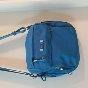 Tumi bright blue crossbody bag